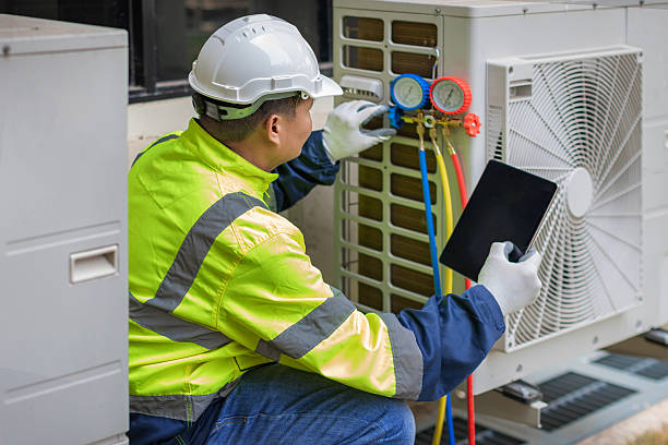 Professional Heat Pump Repair technician working in North Chicago, IL